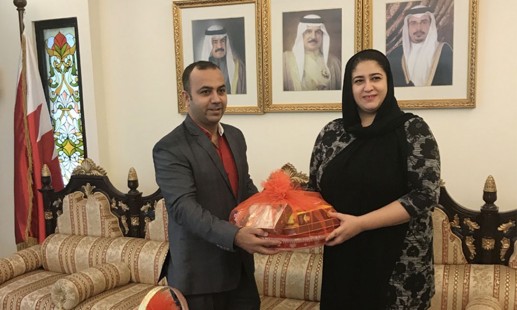 Officials from BLS International and Deputy Ambassador of Bahrain